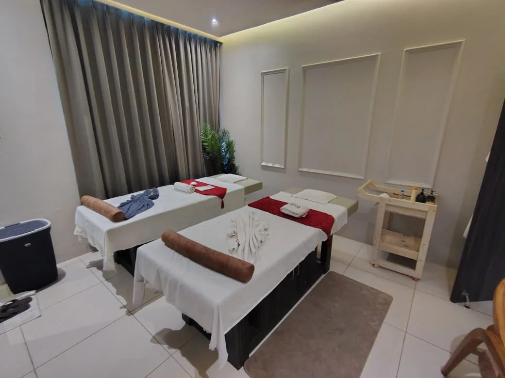 A clean dual-bed treatment room at Body Spa and Wellness in Indore